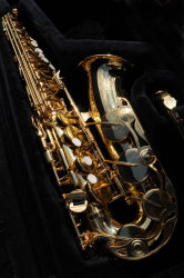 Saxophone being serviced